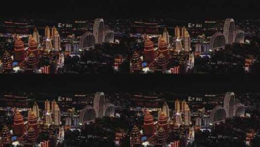 云南西双版纳傣族星光夜市建筑群高空航拍高清在线视频素材下载