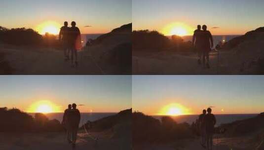 夕阳走向海边的情侣高清在线视频素材下载