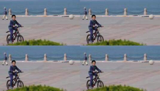 海边骑行的少年高清在线视频素材下载