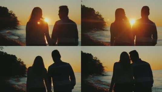 日落时夫妇在海滩上散步高清在线视频素材下载