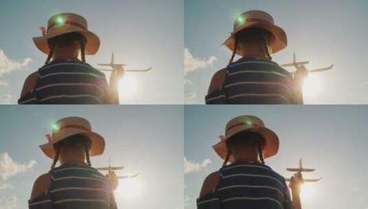 在阳光下玩纸飞机的孩子高清在线视频素材下载