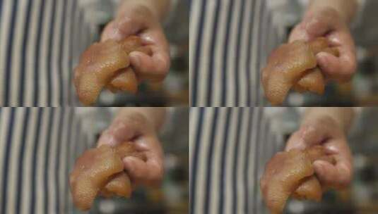 厨师刀工给猪蹄剔骨全过程高清在线视频素材下载
