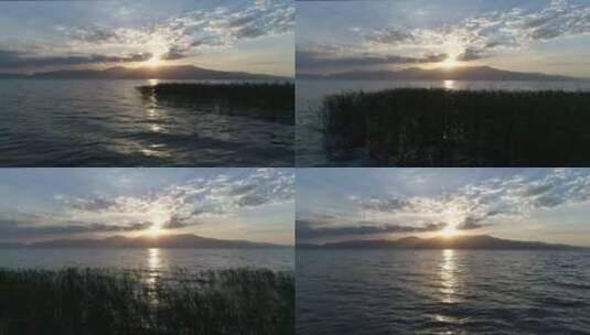 明媚的日落横跨平静的海洋高清在线视频素材下载