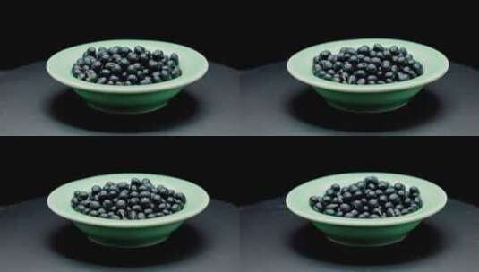 360度黑背景8k环绕实拍中草药材黑豆高清在线视频素材下载