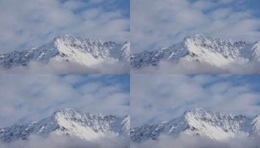雪山顶峰的云景高清在线视频素材下载