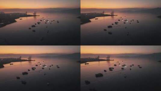 航拍广东惠州大亚湾海景渔船朝阳日出高清在线视频素材下载