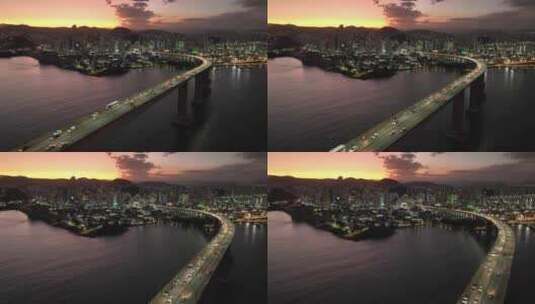 航拍黄昏城市和桥梁高清在线视频素材下载