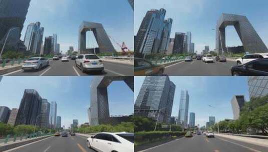 开车行驶在北京国贸CBD城市地标建筑高清在线视频素材下载