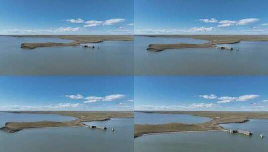 航拍蓝天白云下的内蒙古呼伦贝尔市呼伦湖高清在线视频素材下载