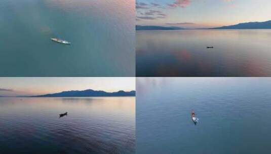 夕阳下湖面渔船打渔高清在线视频素材下载