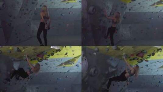 活跃的女攀岩运动员在健身房练习高清在线视频素材下载
