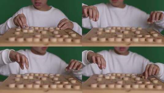 中国小男孩在下棋中国象棋8K实拍高清在线视频素材下载