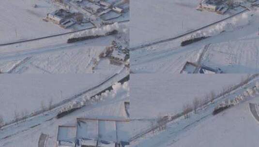 航拍中国东北冬季雪景中的蒸汽火车穿过村庄高清在线视频素材下载