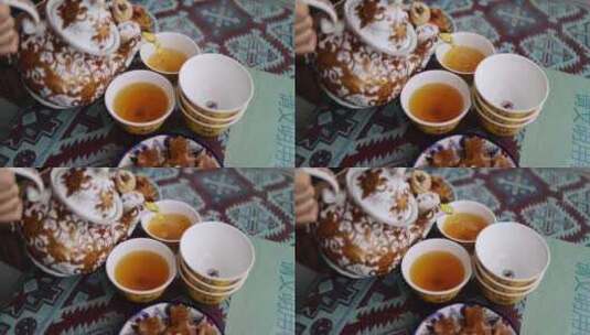 （慢镜）新疆古老的百年老茶馆泡茶倒茶高清在线视频素材下载