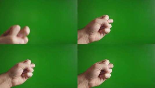 11.一个男人用手（张开）敲绿色背景高清在线视频素材下载