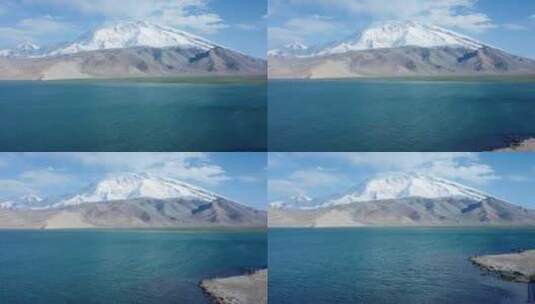 4k航拍新疆慕士塔格峰和喀拉库勒湖泊高清在线视频素材下载
