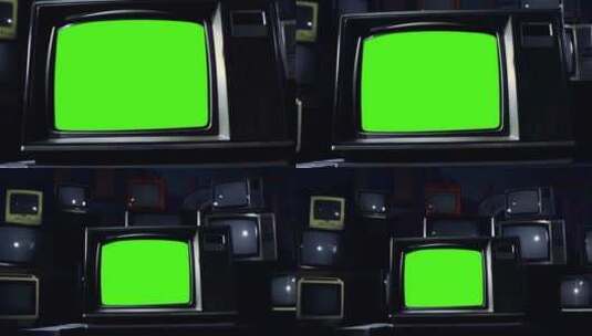 许多旧电视中间带有绿色色度键屏的复古电视机。深色调。多莉出局。高清在线视频素材下载
