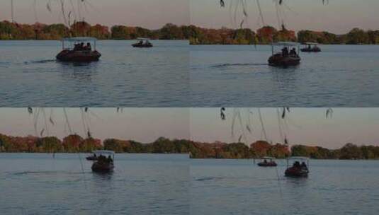 夕阳下的西湖水面与杨公堤秋色高清在线视频素材下载