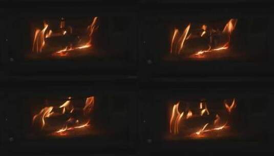 冬天室内取暖壁炉柴火木炭火焰高清在线视频素材下载