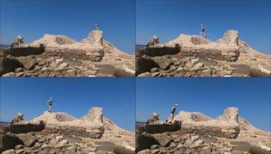 女人在攀爬岩石高清在线视频素材下载