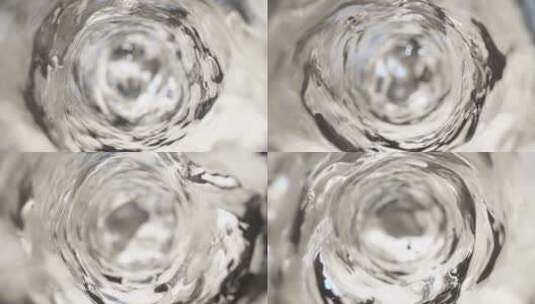 水在玻璃杯里流动高清在线视频素材下载