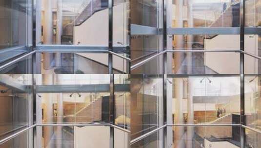 现代商务大楼内上升的观光电梯高清在线视频素材下载