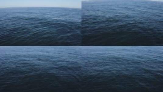 航拍风平浪静的蓝色大海高清在线视频素材下载
