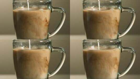 牛奶以慢动作倒入咖啡高清在线视频素材下载