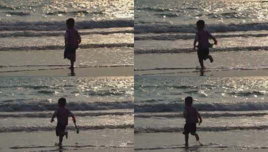 海边奔跑的小孩高清在线视频素材下载