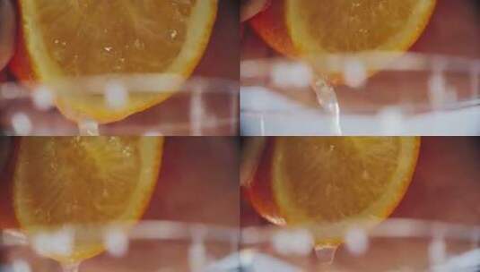 高清橙汁倒在玻璃杯中高清在线视频素材下载