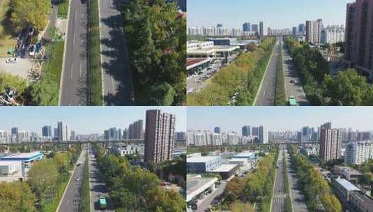 城市道路鸟瞰图，道路两旁绿树成荫高清在线视频素材下载