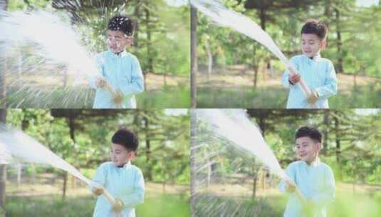 在公园里浇水的快乐男孩高清在线视频素材下载