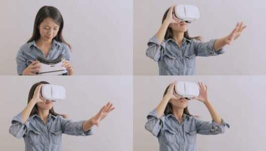 女人使用虚拟眼镜高清在线视频素材下载