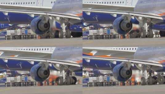 机场的飞机机翼特写镜头高清在线视频素材下载