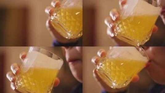 玻璃杯倒果汁喝果汁高清在线视频素材下载
