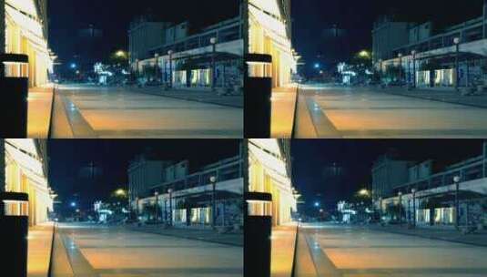 夜间沿街的商店灯光高清在线视频素材下载