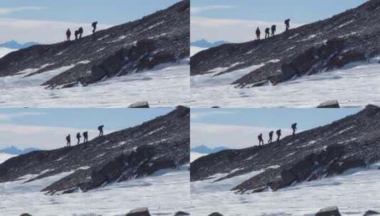 雪山上的徒步旅行者高清在线视频素材下载