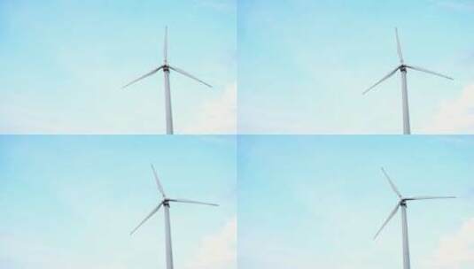 风车风力发电技术——能源生产的低角度视图高清在线视频素材下载