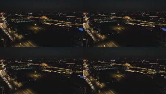 大明宫丹凤门火车站晚上航拍3高清在线视频素材下载