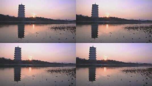 夕阳下的建筑长安塔  冬天的落日高清在线视频素材下载