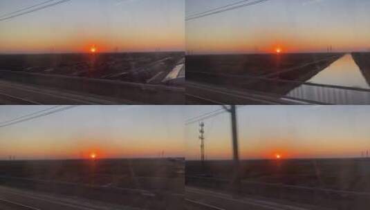 奔驰的高铁列车窗外夕阳落日晚霞高清在线视频素材下载