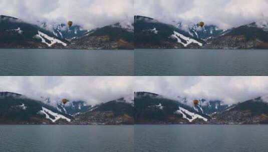 热气球浮空器飞越山湖高清在线视频素材下载