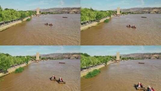 航拍宁夏中卫沙坡头黄河上的羊皮筏子高清在线视频素材下载