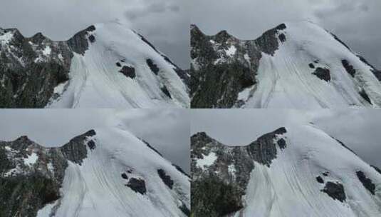 航拍四川甘孜贡嘎山卫峰乌库楚雪山风光高清在线视频素材下载