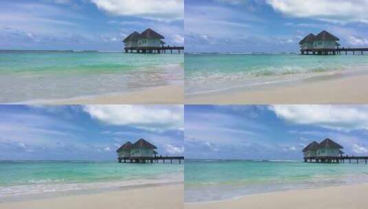 马尔代夫白色沙滩与海上木屋栈道4K风光高清在线视频素材下载