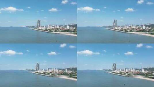 厦门海岸线风光航拍海边城市双子塔建筑风景高清在线视频素材下载