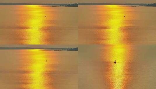 航拍暖色夕阳湖面 小船高清在线视频素材下载