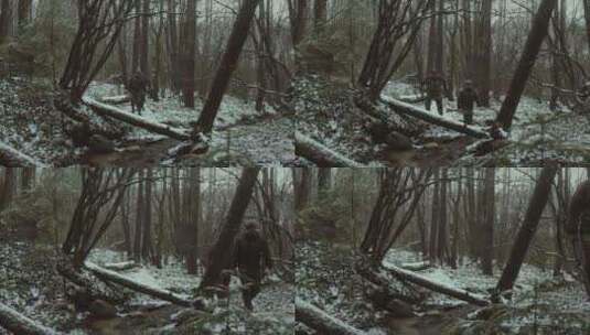 大雪过后在护林员在森林中巡逻高清在线视频素材下载
