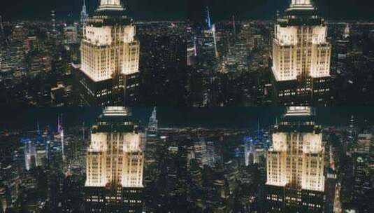 建立拍摄曼哈顿帝国州摩天大楼夜晚城市灯光高清在线视频素材下载