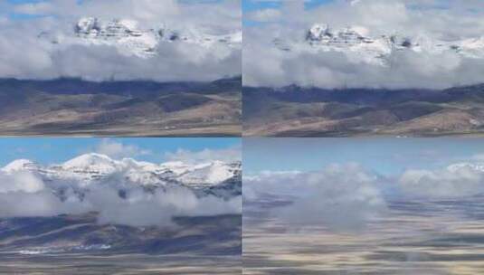 4K航拍西藏玛旁雍措雪山云海高清在线视频素材下载